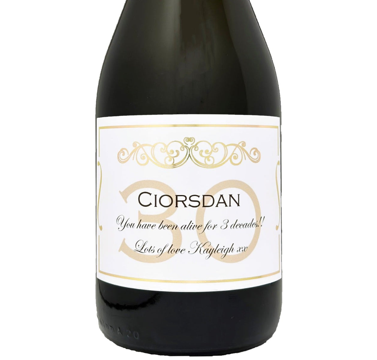 Bottle of Prosecco with a personalised 30th birthday label in gold, showing a name and Happy 30th Birthday message