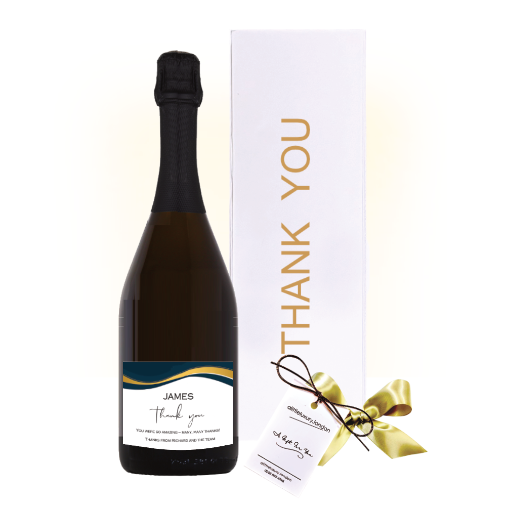 Personalised Prosecco thank you gift beside a white gold-lettered Thank You gift box with hand-tied bow