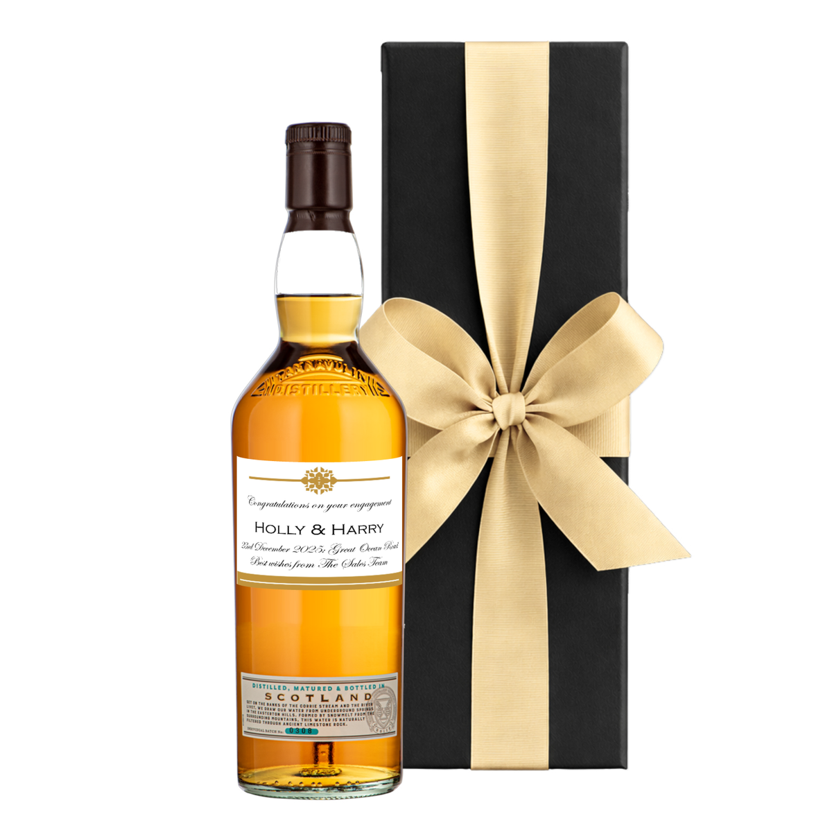 Personalised Speyside single malt whisky with a name and message label beside a luxury black gift box with a bow