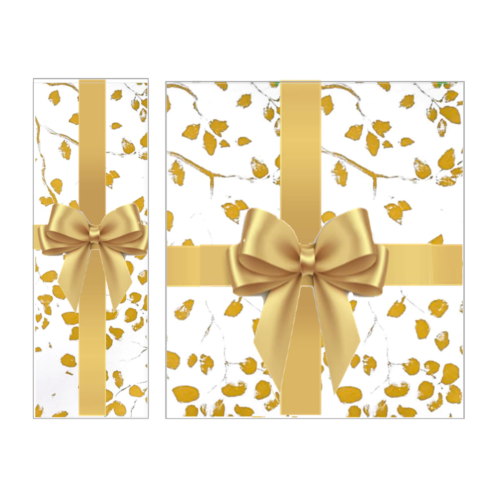 Two gifts in white paper with gold leaves, each tied with a gold satin ribbon and a large gold bow