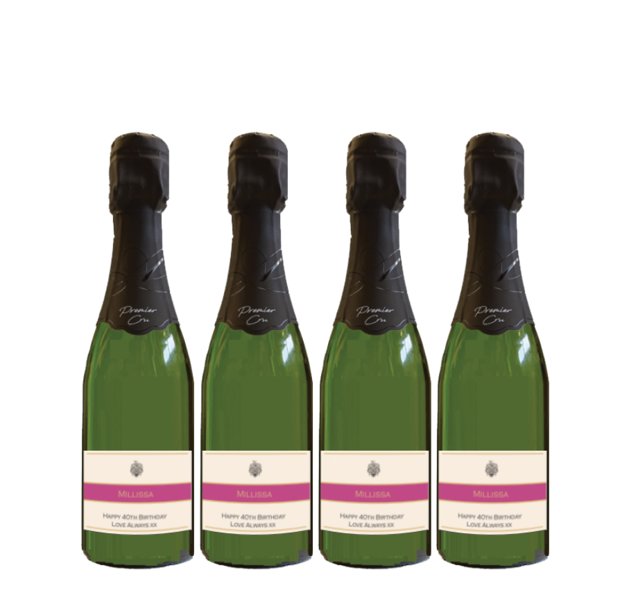 Four mini Premier Cru Champagne bottles with personalised cream labels and a pink band
