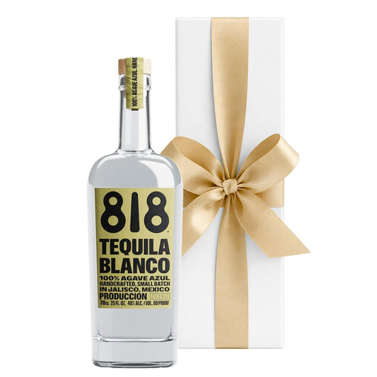 Bottle of 818 Blanco Tequila beside a luxury white gift box, a fresh small-batch tequila gift