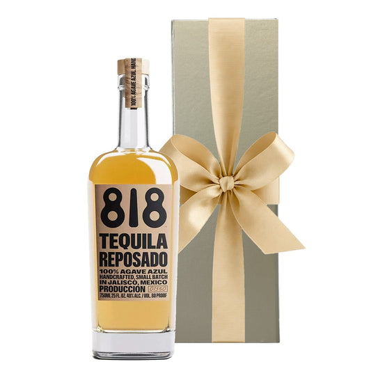 Bottle of 818 Reposado Tequila beside a luxury gold gift box, an award-winning tequila gift