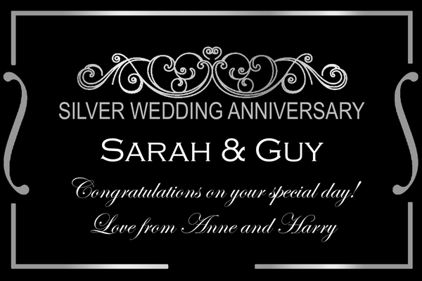 Sleek black and silver Silver Wedding Anniversary Champagne label with ornate silver scrolls and the couple's names