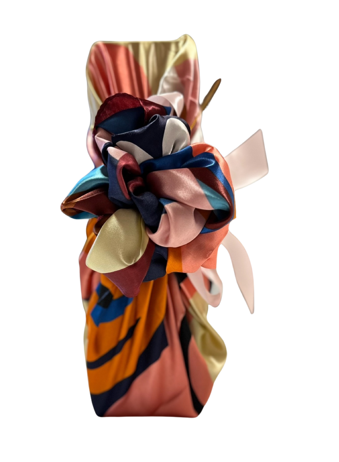 Bright multicoloured silky ladies scarf used as a Furoshiki bottle wrap, full-length view