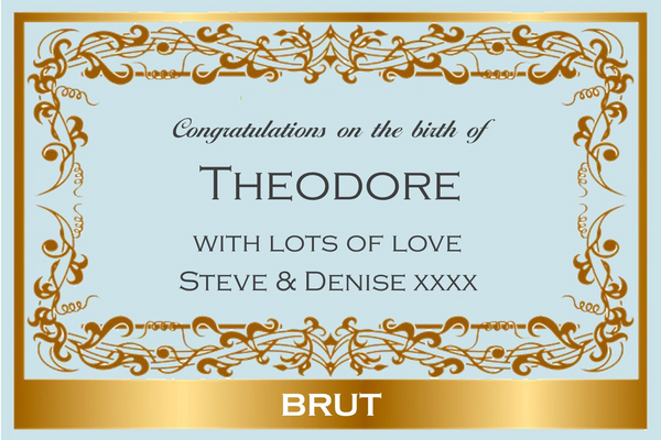 New baby Champagne label with an ornate gold frame on pale blue, 'Congratulations on the birth of' and name