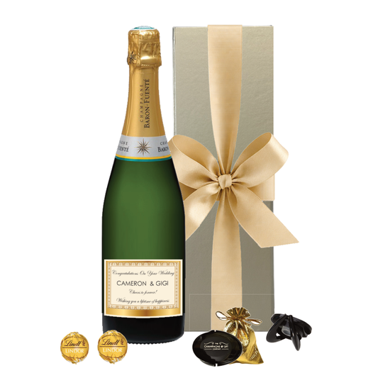 Personalised Grande Réserve Champagne gift with a bottle stopper and Swiss truffles — an elegant gold-label celebration gift