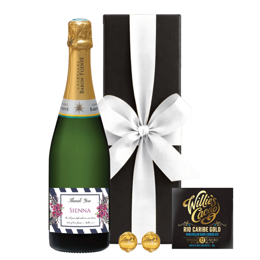 Personalised Champagne with a floral Thank You label, black gift box with white bow, Willie's Cacao bar and Lindor truffles.