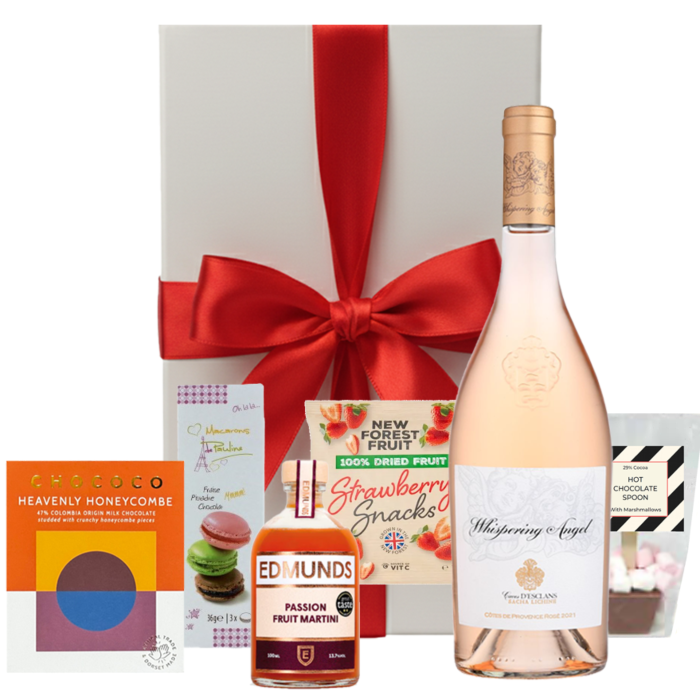 The Luxe Treat Box hamper with Whispering Angel rosé, cocktail, macarons and sweet treats