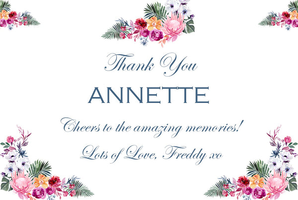 Thank You Champagne label with vivid pink and purple bouquets, the name in blue and a cheerful message