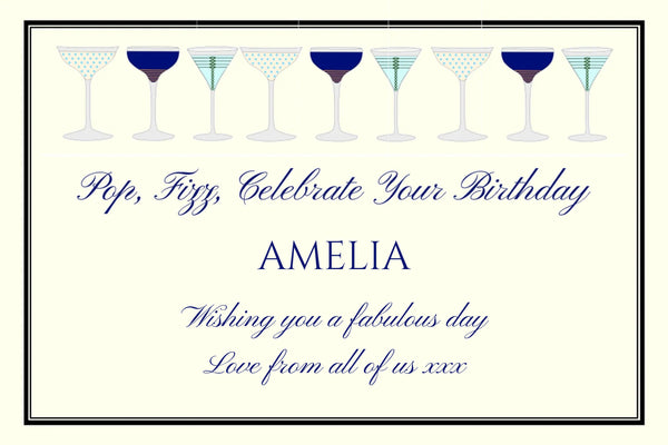 Playful birthday Champagne label with a row of cocktail glasses and 'Pop, Fizz, Celebrate Your Birthday' in navy