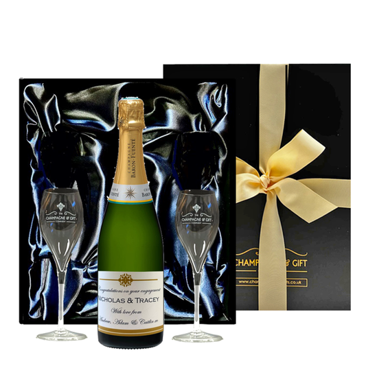 Silk lined black gift box with Champagne and flutes