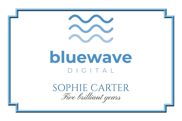 Corporate Champagne label branded with your logo in a light blue frame, with a name and a strap line