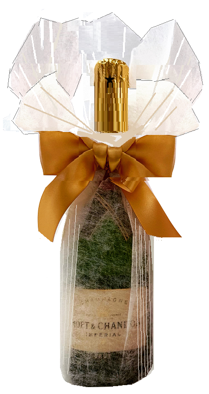 Champagne bottle hand-wrapped in a soft white gift wrap, gathered at the neck with a golden satin bow.