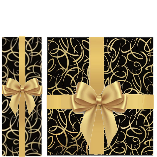 Bottle and gift box hand-wrapped in black paper with gold swirls and a gold satin ribbon bow
