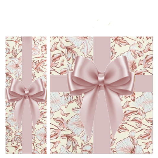 Bottle and gift box hand-wrapped in cream paper with blush pink florals and a pink satin ribbon bow