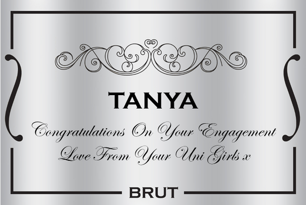 Brushed silver personalised Champagne label with an ornate scroll, curved brackets and BRUT – pure glamour