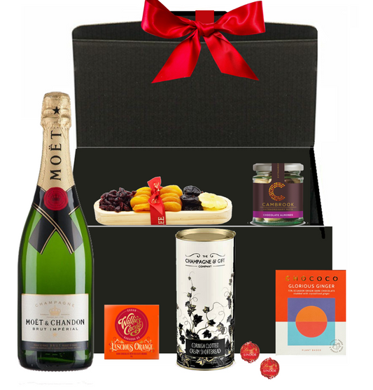 Christmas hamper with Moët & Chandon Impérial Champagne, chocolates, truffles, biscuits and treats in a luxury gift box