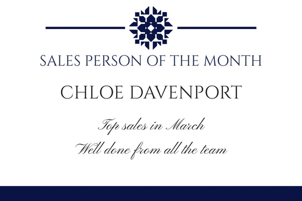 Sales Person of the Month Champagne label with a navy flower motif, the star seller's name and a message