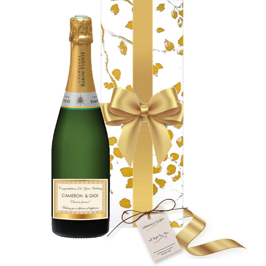 Personalised Classic Cuvée Champagne with your own label, hand gift-wrapped in Elegant Gold Leaf wrap with a gift tag