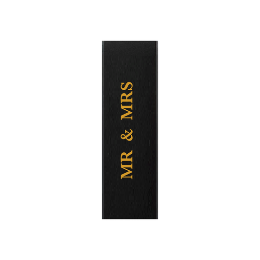 Black gift box with MR & MRS in gold lettering running up the front