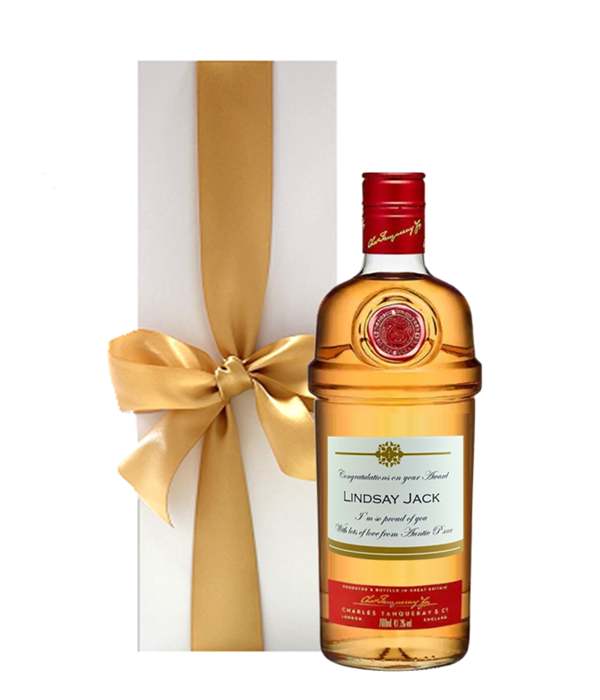 Personalised Seville orange gin with a name and message label beside a white presentation box tied with a bow
