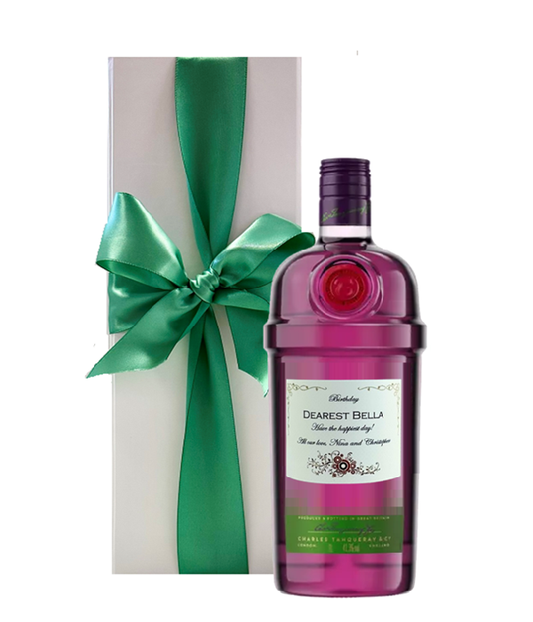 Personalised blackcurrant gin with a name and message label beside a white presentation box tied with a bow