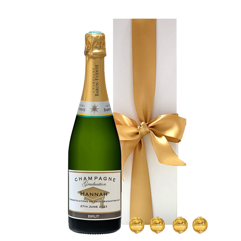 Personalised for a graduation gift with name and message. Classic Cuvée Champagne beside a white gift box with ribbon.
