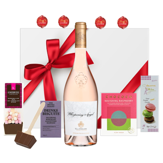 Whispering Angel rose wine hamper with raspberry chocolate, macarons and truffles in a white hand-tied box