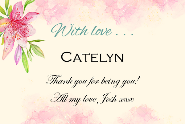 Soft watercolour pink lilies frame a personalised Champagne label with 'With love…' in mint script and a name