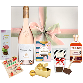 Rosé Affair hamper with Whispering Angel Provence rosé, passion fruit martini and sweet treats in a white gift box