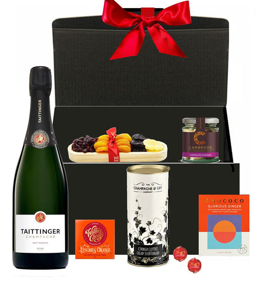 Christmas hamper with personalised Taittinger Brut Réserve Champagne, chocolates, truffles, biscuits and treats in a gift box