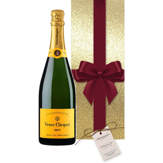 Veuve Clicquot Yellow Label Champagne hand gift-wrapped in Classic Gold wrap with an A Little Luxury gift tag