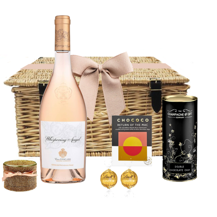 Whispering Wishes hamper with Whispering Angel rosé, chocolate, candle and biscuits in a wicker basket